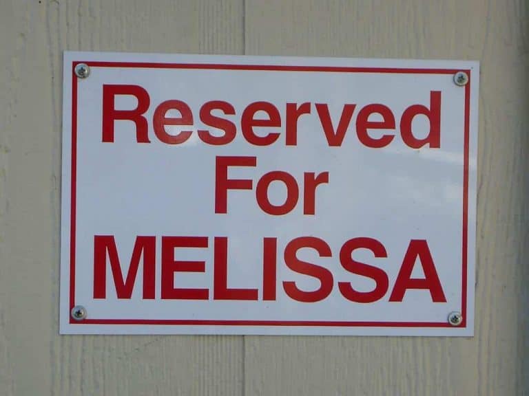 Sign: Reserved for Melissa parking space