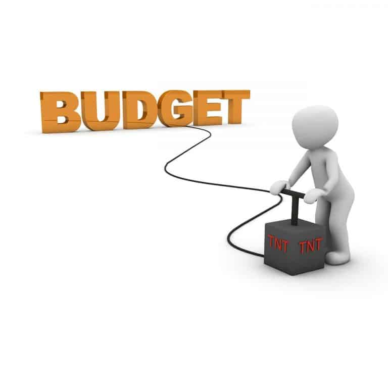 Person detonating budget explosion illustration.